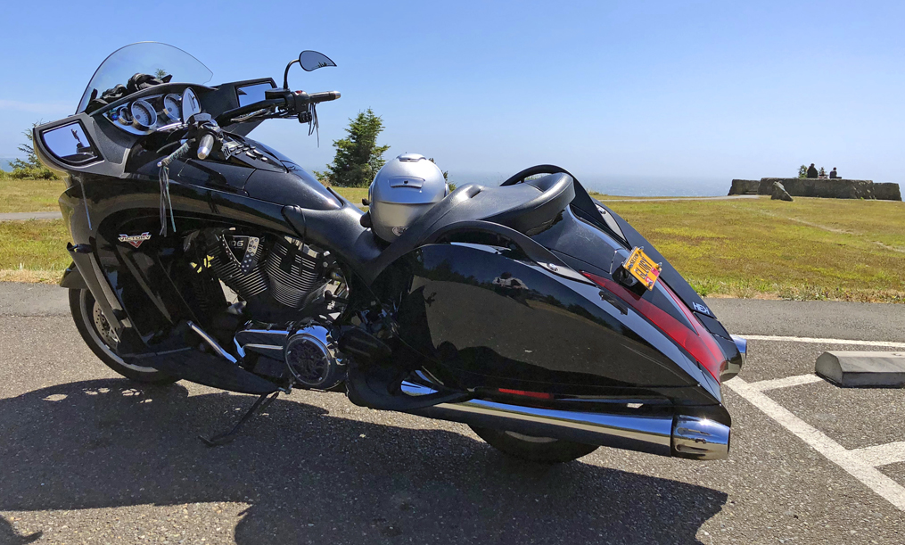 Elizabeth's Motorcycle at the coast on a sunny day