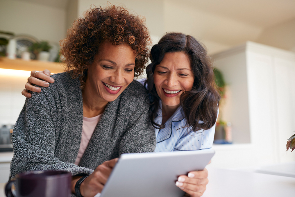 Understanding the Differences Among Popular Retirement Account Options_two mature women discussing retirement options