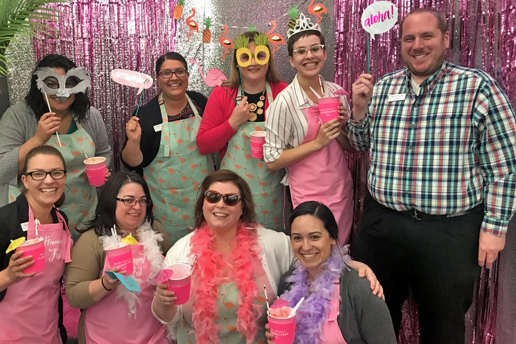 monica with member services team on Flamingo day