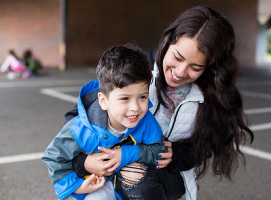 community giving-two young students impacted by the Adelante Mujeres organization