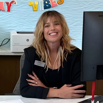 sam ikebe at desk employee spotlight
