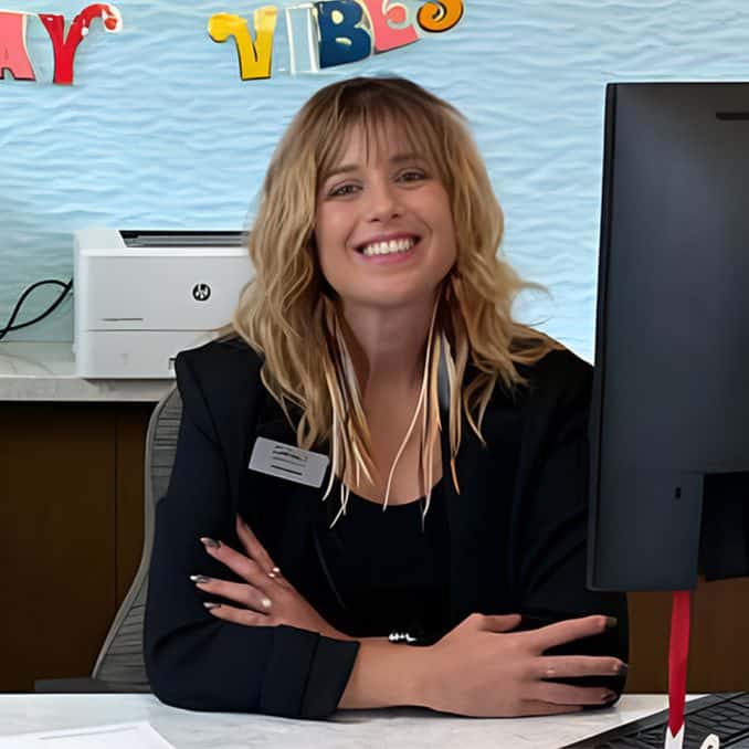 sam ikebe at desk employee spotlight