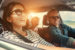 family driving through the country