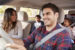 Young family driving in their car.