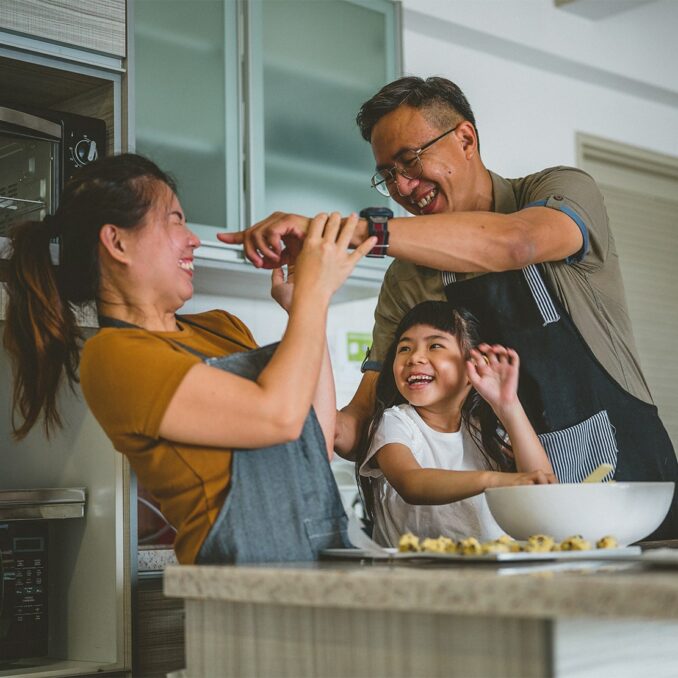 family cooking dinner together
