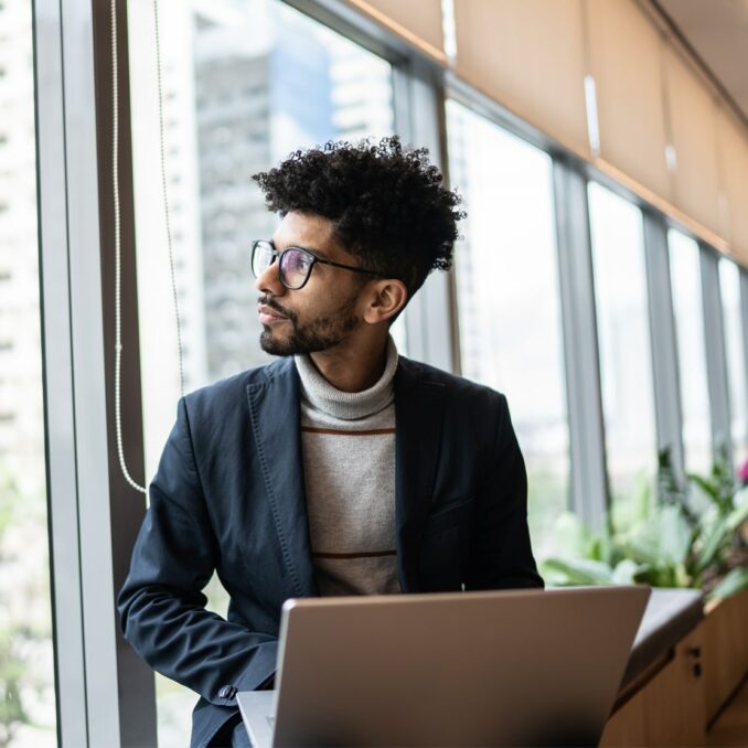 business man looking outside