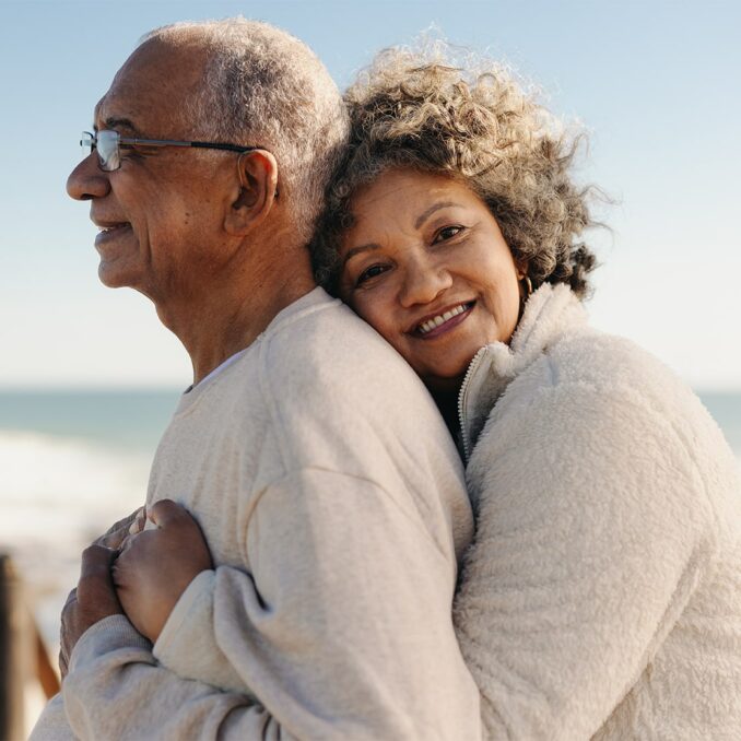 romantic senior couple at the beach