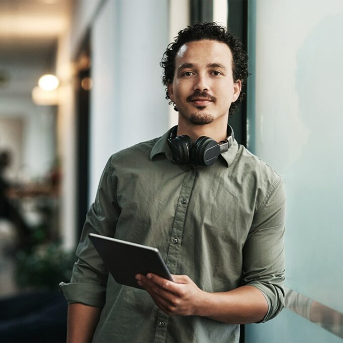 handsome young businessman standing in the office