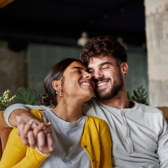 Beautiful couple embracing with great affection
