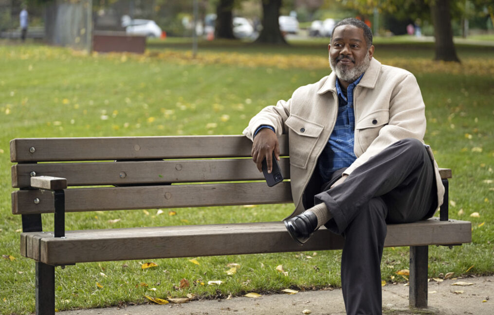 financial planning-man sitting on a bench in Wallace Park in NW Portland considering his future