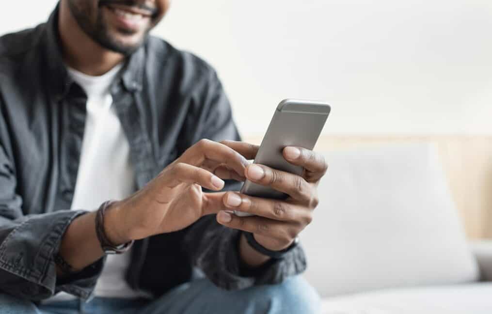 financial counseling-man using cellphone