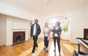 couple talking with their realtor or mortgage loan officer