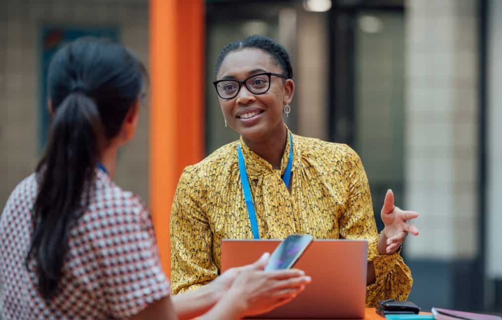 nonprofit business solutions-two workers discussing