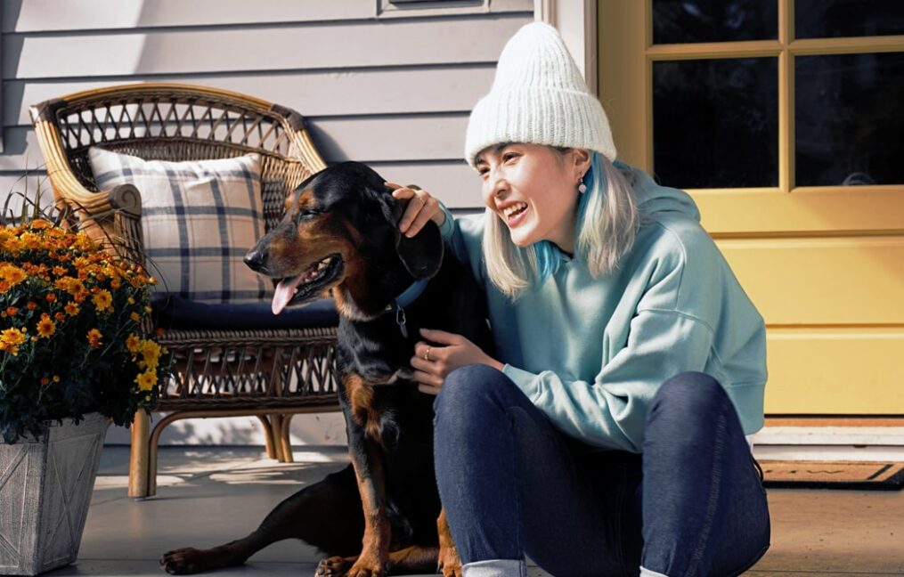 our story-photo of girl and her dog on porch