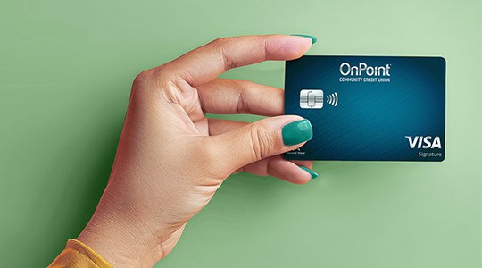 signature visa home page body hand holding onpoint credit card