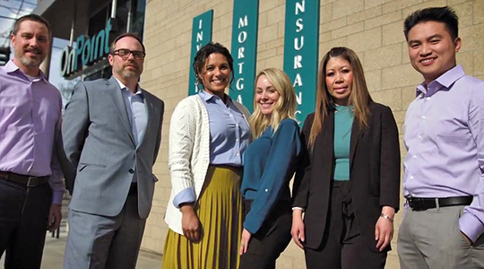 OnPoint mortgage-team outside local OnPoint branch in downtown portland