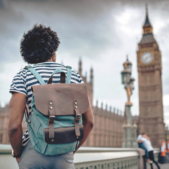 OnPoint member assistance-man traveling internationally looking at Big Ben in London-540x540