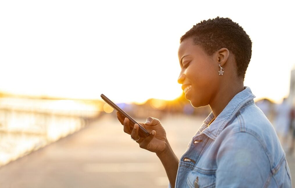 woman looking at phone